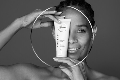 Naming, Branding and Packaging design for SINCERE products using a black and white palette. A silver circle 'lens' highlights the product benefits, with color codes for Hair (Lilac) and Sun (Gold).