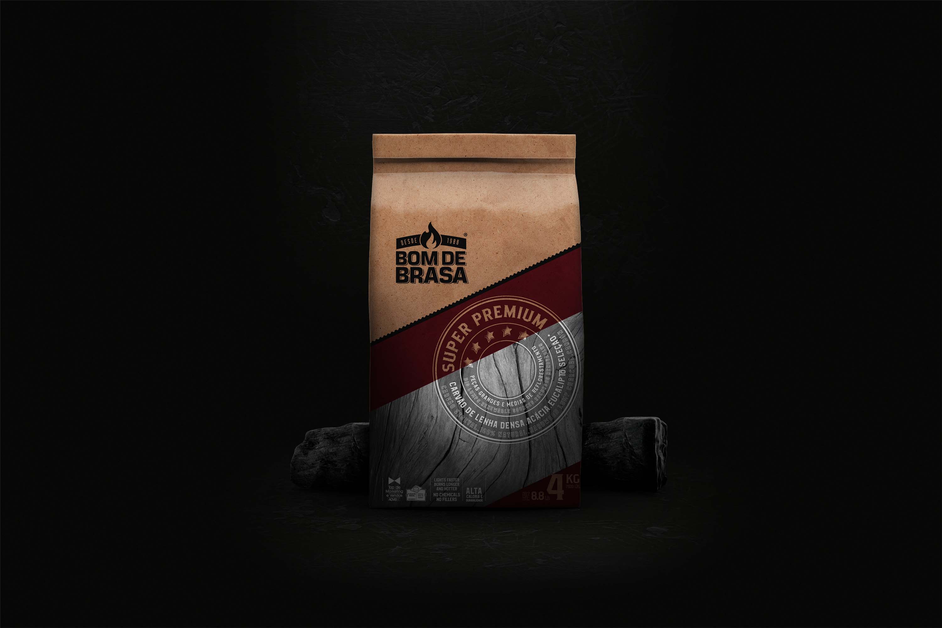Redesign of the paper packaging for Bom de Brasa charcoal, featuring strong graphics and typography optimized for the export market. Packaging design project by ENTRE Design.